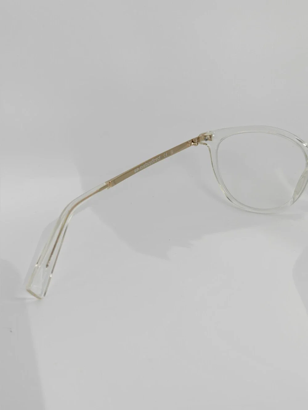 Atitude. Clear Round Frame Gold Temples. Women's Glasses - Transparent
